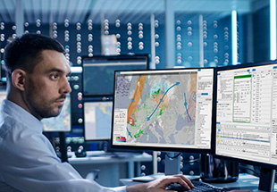        Picture of a man holding a tablet and a woman next to him pointing to tablet screen.     Flight Operations