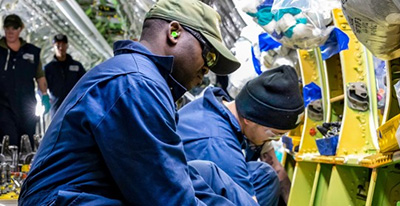 Employees working on airplane