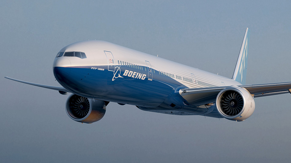 Picture of Boeing 7 7 7 in flight.