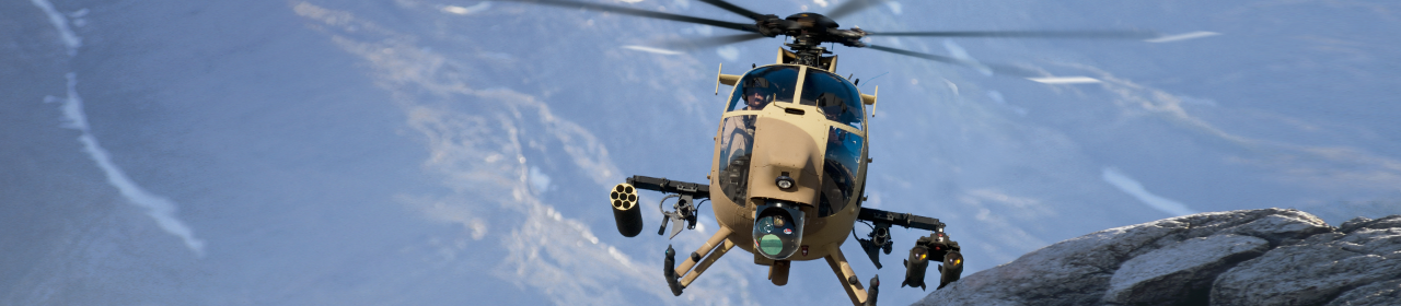 AH-6 front view with hills in the background